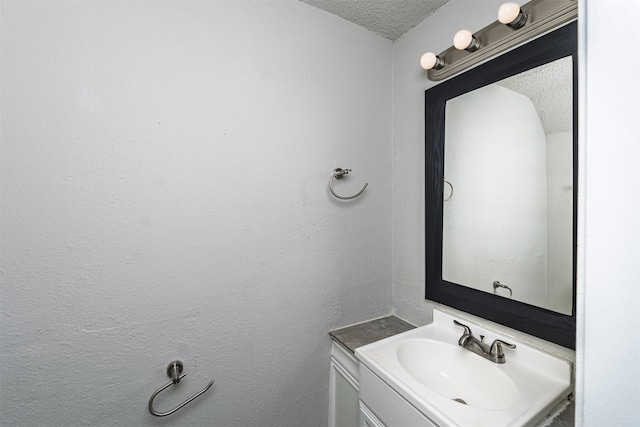4927 Miller Ave, Fort Worth, TX 76119 - bathroom with vanity and a textured ceiling