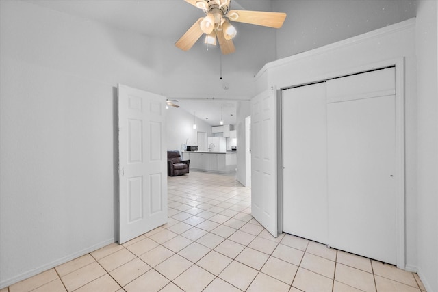 5405 Four Winds Dr, Arlington, TX 76018 - unfurnished room featuring a ceiling fan, light tile patterned floors, and lofted ceiling