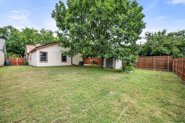 5405 Four Winds Dr, Arlington, TX 76018 - fenced backyard with a storage unit