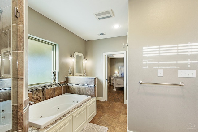 140 Stark Ln, Sherman, TX 75090 - full bath featuring a whirlpool tub, vanity, and an enclosed shower