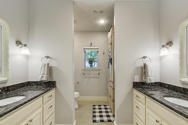 140 Stark Ln, Sherman, TX 75090 - full bath featuring two vanities and a shower with shower curtain