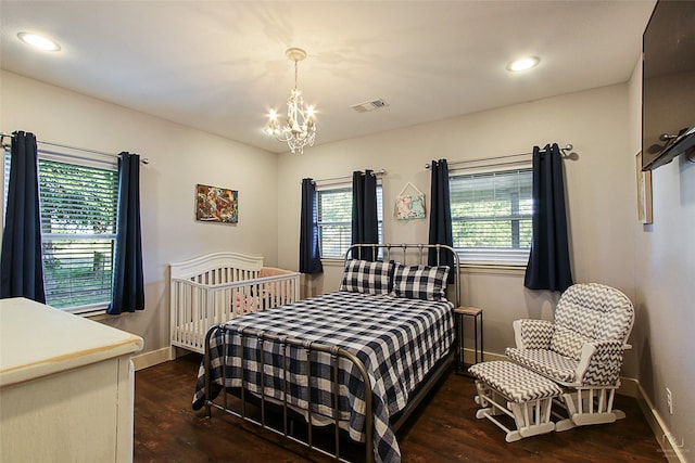 140 Stark Ln, Sherman, TX 75090 - bedroom with a chandelier, dark wood-type flooring, and recessed lighting