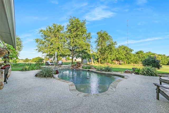 140 Stark Ln, Sherman, TX 75090 - swimming pool featuring a patio and a yard