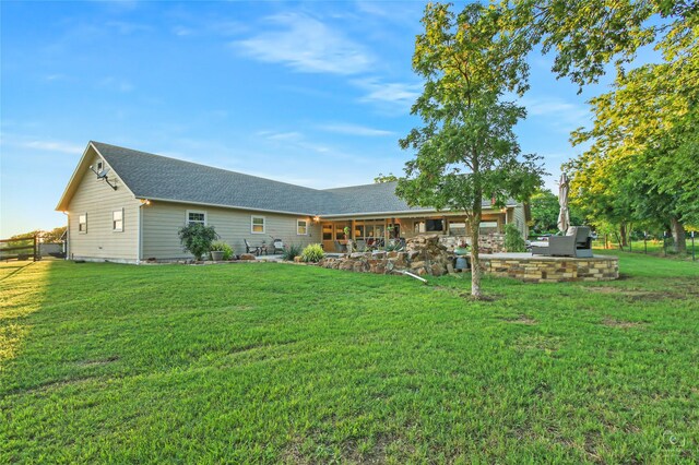140 Stark Ln, Sherman, TX 75090 - back of property with a yard and a shingled roof