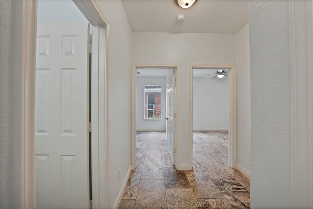 4418 Spring Garden Dr, Arlington, TX 76016 - corridor with stone tile flooring and baseboards