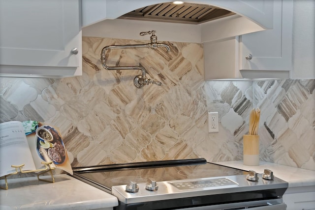 4418 Spring Garden Dr, Arlington, TX 76016 - detailed view of pot filler, arched walkways, tasteful backsplash, and light countertops
