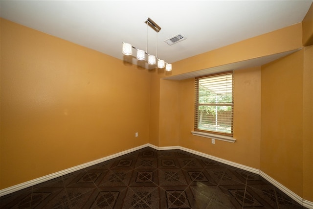 1825 E Shore Dr, Dallas, TX 75217 - spare room featuring baseboards