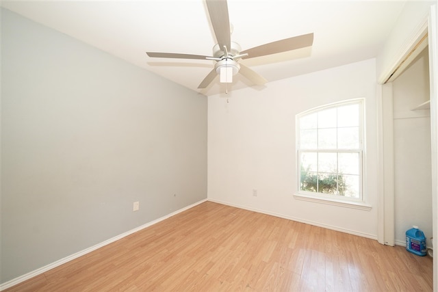 1825 E Shore Dr, Dallas, TX 75217 - unfurnished bedroom with light wood-style flooring and ceiling fan