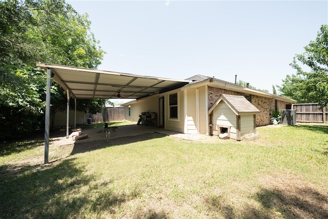 1825 E Shore Dr, Dallas, TX 75217 - rear view of house featuring a carport and brick siding