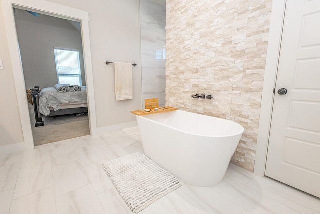 9209 Old Stoney Rd, Ponder, TX 76259 - full bath with a soaking tub and ensuite bathroom