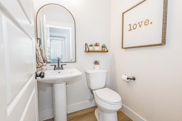 9209 Old Stoney Rd, Ponder, TX 76259 - bathroom featuring toilet and wood finished floors