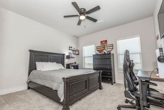 9209 Old Stoney Rd, Ponder, TX 76259 - bedroom featuring light carpet, a desk, and a ceiling fan