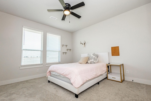 9209 Old Stoney Rd, Ponder, TX 76259 - carpeted bedroom with baseboards and a ceiling fan