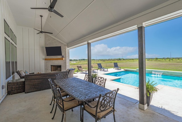 9209 Old Stoney Rd, Ponder, TX 76259 - view of patio / terrace featuring a ceiling fan, an outdoor pool, and an outdoor living space with a fireplace