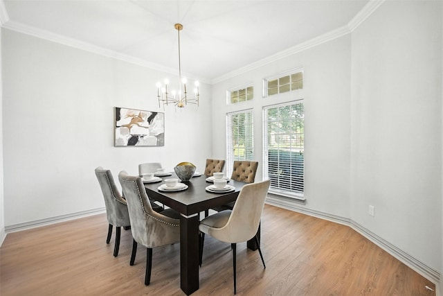 901 Bluebird Ct, Burleson, TX 76028 - dining room featuring ornamental molding, wood finished floors, and a chandelier