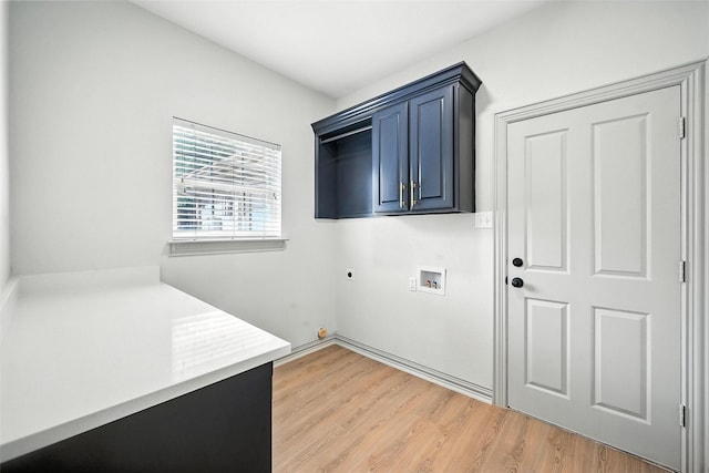 901 Bluebird Ct, Burleson, TX 76028 - washroom with hookup for an electric dryer, cabinet space, washer hookup, and light wood-style flooring
