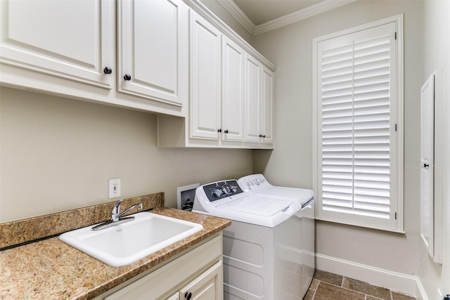 11937 Edgestone Rd, Dallas, TX 75230 - laundry room featuring separate washer and dryer, crown molding, cabinet space, and dark stone finish floors