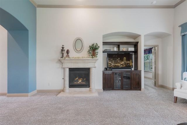 306 Spruce Trl, Forney, TX 75126 - living room with carpet floors, crown molding, and a premium fireplace