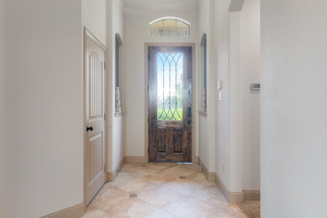 306 Spruce Trl, Forney, TX 75126 - foyer featuring arched walkways and light tile patterned floors