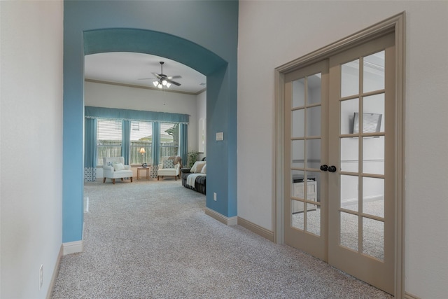 306 Spruce Trl, Forney, TX 75126 - hall featuring carpet flooring, arched walkways, and french doors