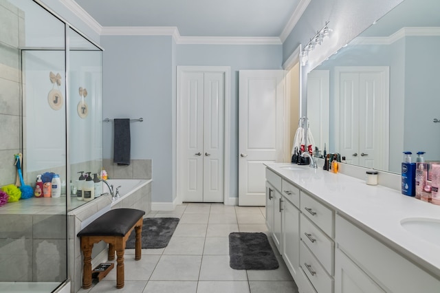 5616 Traveller Dr, North Richland Hills, TX 76180 - full bathroom featuring a bath, double vanity, tile patterned floors, a shower stall, and ornamental molding