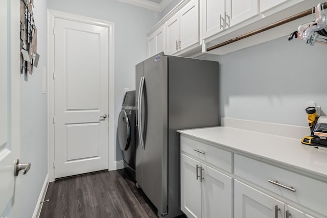 5616 Traveller Dr, North Richland Hills, TX 76180 - kitchen with stainless steel fridge, washing machine and clothes dryer, crown molding, light countertops, and dark wood finished floors