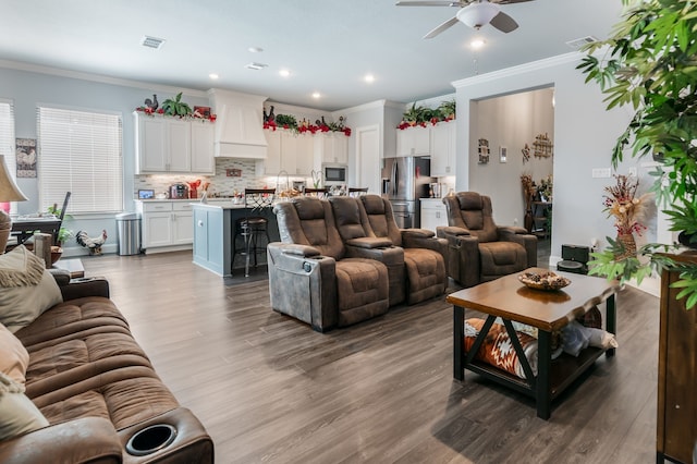 5616 Traveller Dr, North Richland Hills, TX 76180 - living room featuring ceiling fan, wood finished floors, crown molding, and recessed lighting