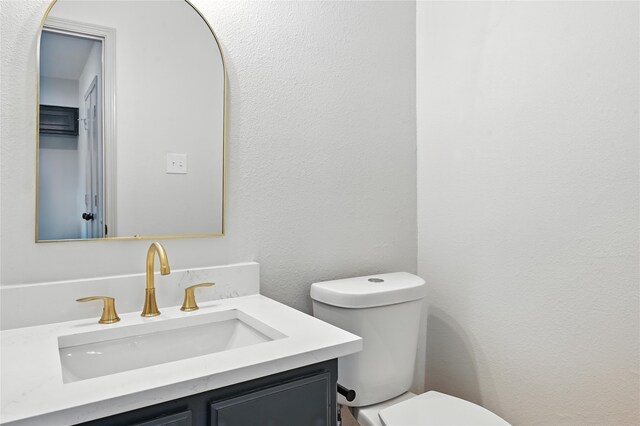 5717 Red Cactus Ct, Arlington, TX 76017 - half bathroom with toilet and vanity