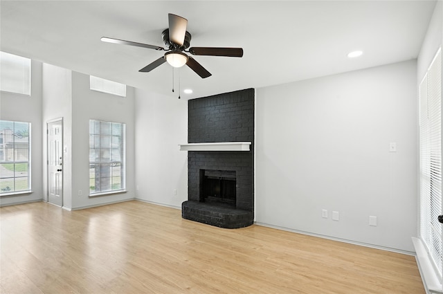 5717 Red Cactus Ct, Arlington, TX 76017 - unfurnished living room featuring wood finished floors, ceiling fan, plenty of natural light, and recessed lighting