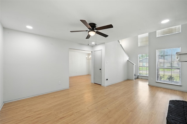 5717 Red Cactus Ct, Arlington, TX 76017 - unfurnished living room with ceiling fan, light wood finished floors, and recessed lighting