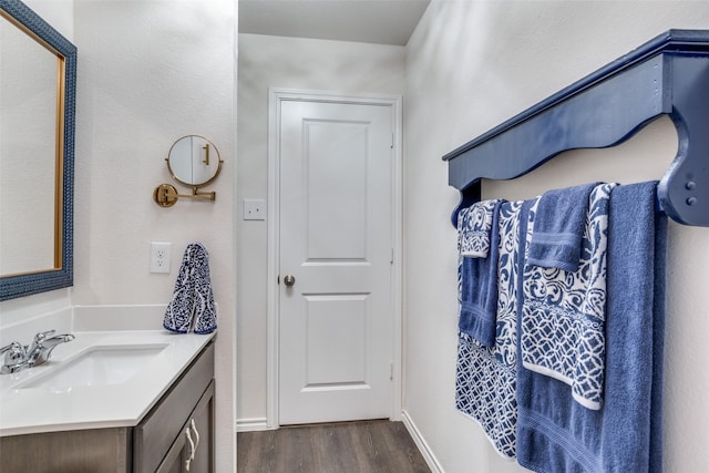819 Twin Edge Dr, Royse City, TX 75189 - bathroom featuring wood finished floors and vanity
