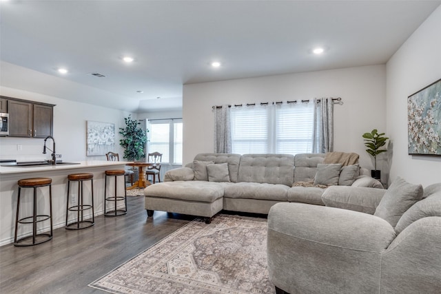 819 Twin Edge Dr, Royse City, TX 75189 - living area featuring dark wood-style flooring and recessed lighting