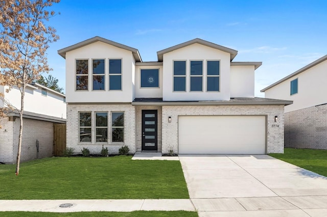 3763 Wenatche Dr, Dallas, TX 75233 - contemporary house with an attached garage, a front lawn, stucco siding, concrete driveway, and brick siding