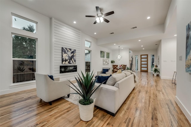 1403 Pueblo St, Dallas, TX 75212 - living room with light wood-style floors, recessed lighting, and ceiling fan