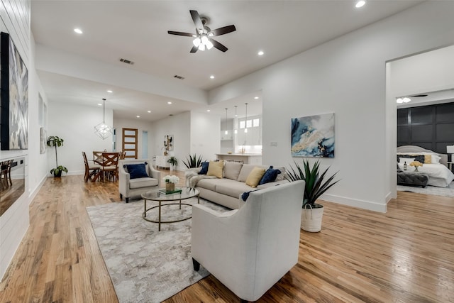 1403 Pueblo St, Dallas, TX 75212 - living room featuring light wood-type flooring, ceiling fan, and recessed lighting