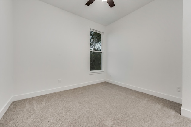 1403 Pueblo St, Dallas, TX 75212 - unfurnished room with light colored carpet, a ceiling fan, and vaulted ceiling