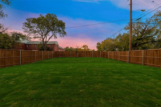1403 Pueblo St, Dallas, TX 75212 - yard at dusk featuring a fenced backyard