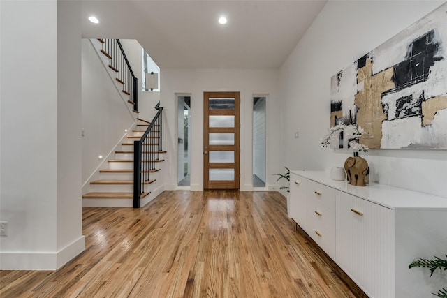 1403 Pueblo St, Dallas, TX 75212 - foyer with light wood-style flooring, stairway, and recessed lighting