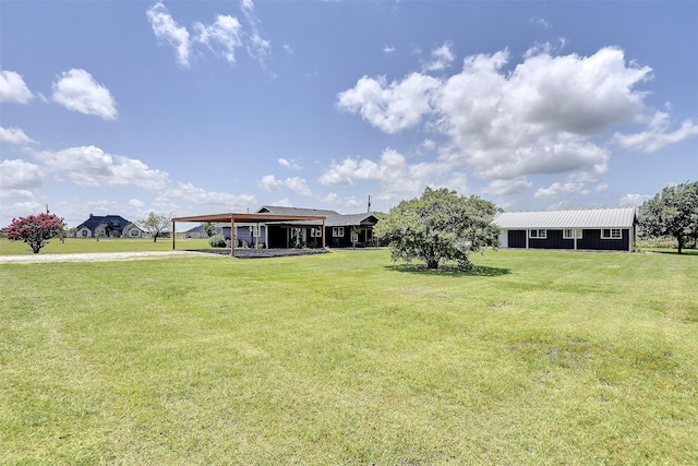351 Marion Rd, Venus, TX 76084 - view of green lawn with driveway and an attached carport