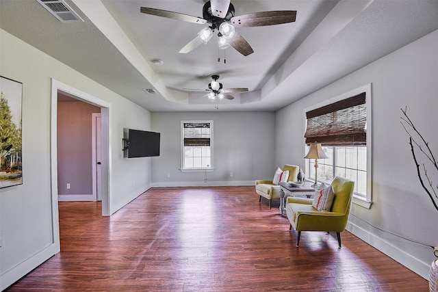 351 Marion Rd, Venus, TX 76084 - living area featuring a tray ceiling, a ceiling fan, and wood finished floors
