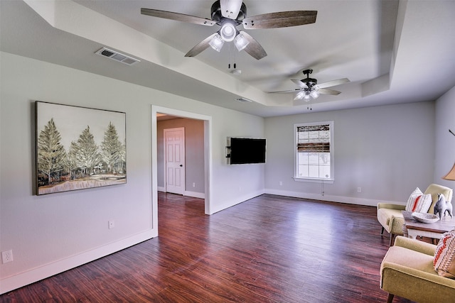 351 Marion Rd, Venus, TX 76084 - living room featuring a raised ceiling, ceiling fan, and wood finished floors