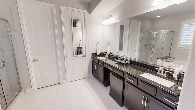 1320 Ponca St, Carrollton, TX 75010 - full bath with a shower stall, double vanity, and a bath