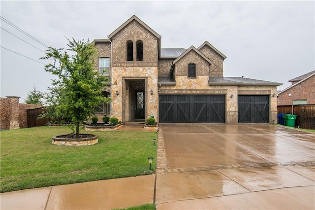1320 Ponca St, Carrollton, TX 75010 - french country home featuring driveway, an attached garage, stone siding, and brick siding