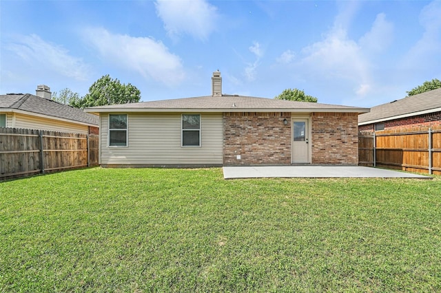 1908 Ramada Trl, Fort Worth, TX 76247 - rear view of property featuring a patio area, a fenced backyard, brick siding, and a chimney