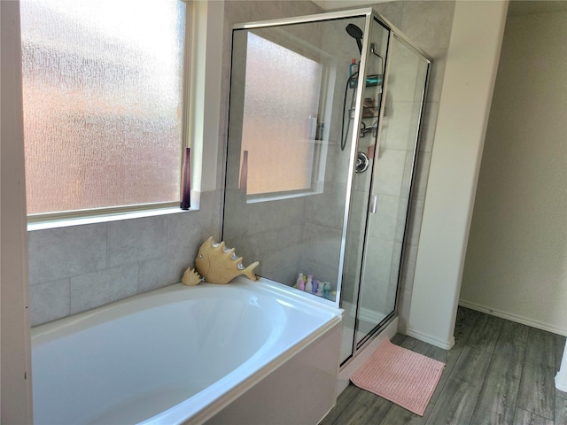 1460 Acmite Ave, Cross Roads, TX 76227 - full bath featuring a stall shower, a garden tub, and wood finished floors