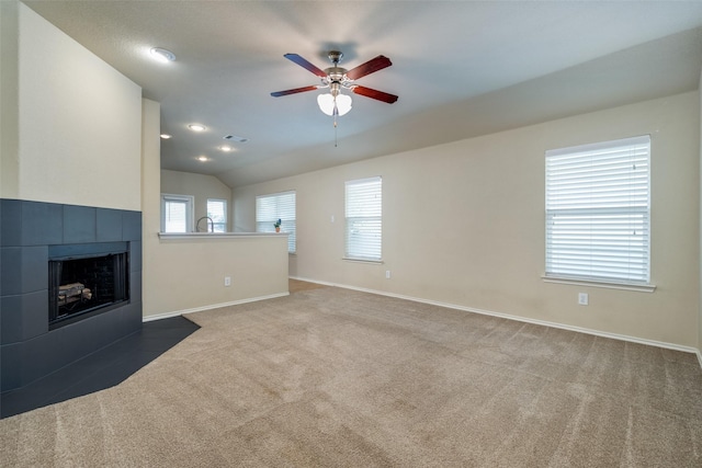 9032 Eagle Dr, Providence Village, TX 76227 - unfurnished living room with ceiling fan, carpet flooring, a fireplace, and vaulted ceiling