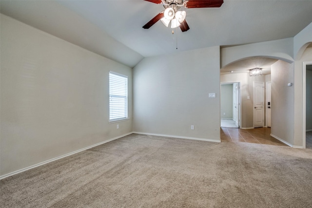 9032 Eagle Dr, Providence Village, TX 76227 - spare room with arched walkways, carpet floors, ceiling fan, and vaulted ceiling