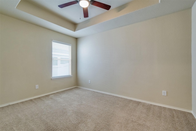 9032 Eagle Dr, Providence Village, TX 76227 - unfurnished room featuring carpet, ceiling fan, and a tray ceiling