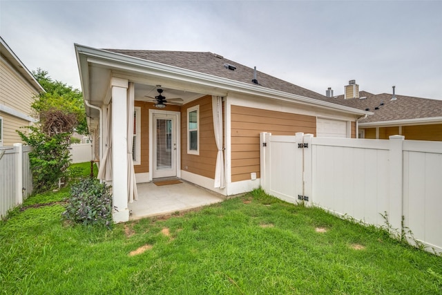 9032 Eagle Dr, Providence Village, TX 76227 - rear view of property with ceiling fan, a fenced backyard, a patio, a garage, and a shingled roof