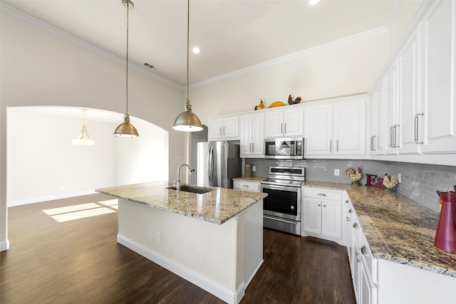 3014 Preston Club Dr, Sherman, TX 75092 - kitchen featuring appliances with stainless steel finishes, ornamental molding, decorative backsplash, dark wood finished floors, and recessed lighting